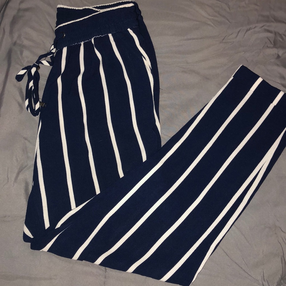 Navy blue pinstriped pants